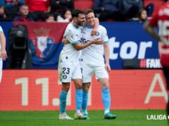 Tsygankov celebra un gol en Liga con el Girona junto a Iván Martín